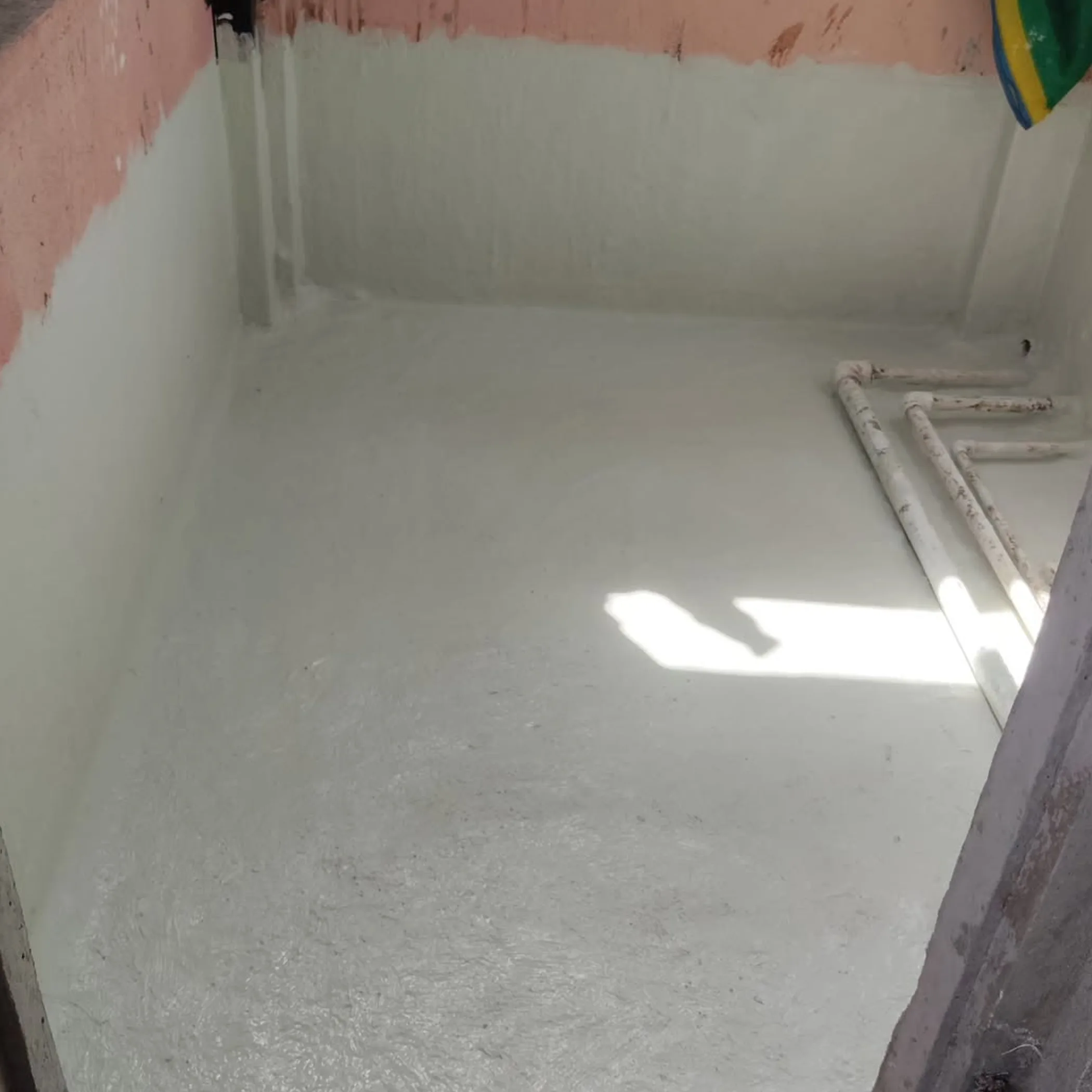 waterproofed wet-area floor with plumbing
